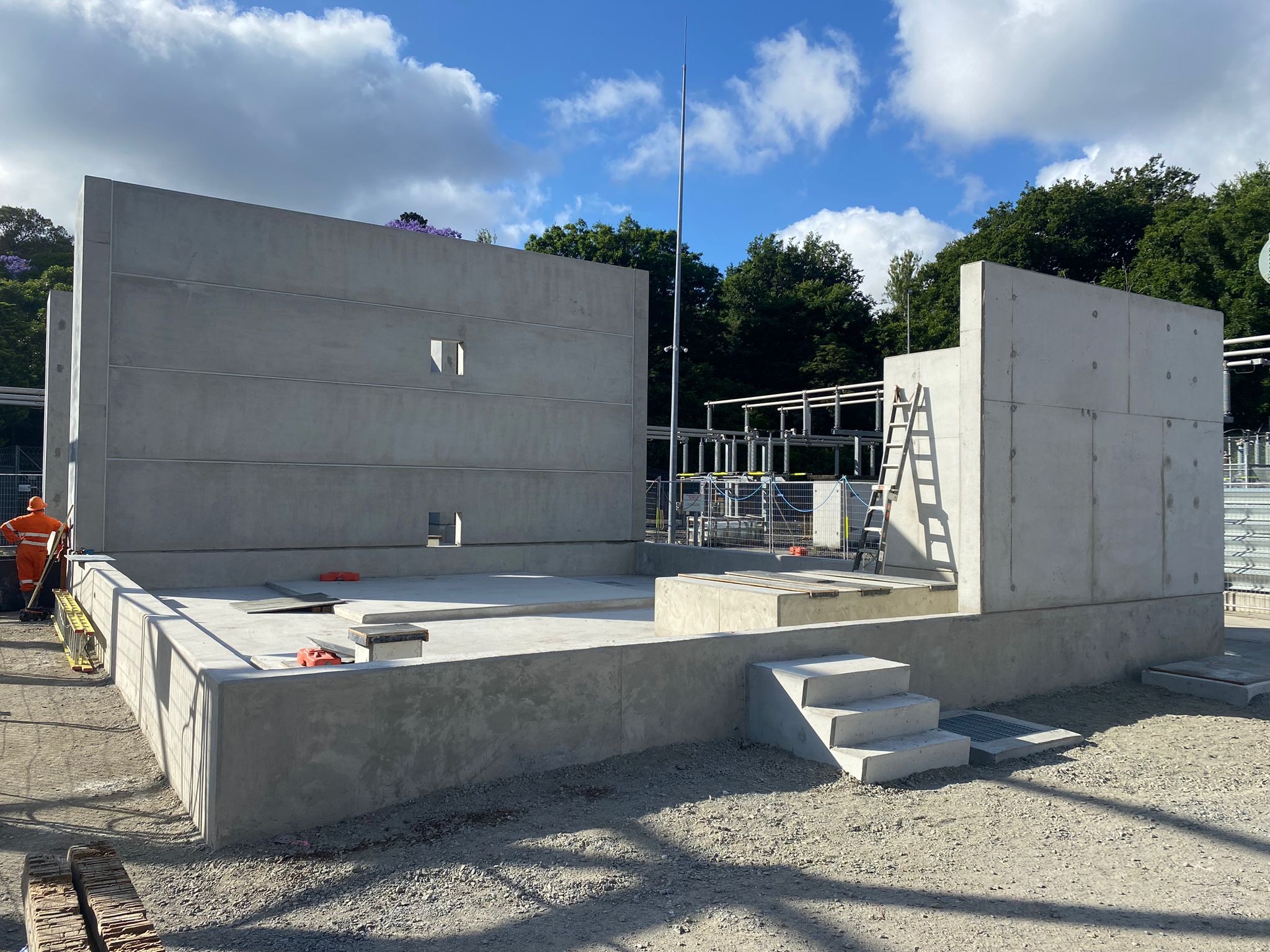 Completed formed concrete walls and base slab at an infrastructure site